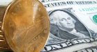 Commodity prices, Euro debt worries drag loonie down