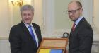 Stephen Harper has harsh words for Putin on historic visit to Ukraine