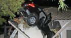 Driver launches BMW off highway, plunges through family�s roof 20 feet below, then leaves scene | National Post